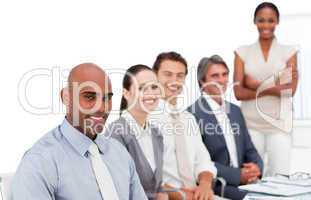 Self-assured multi-ethnic business group at a presentation