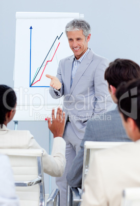 Charming businessman doing a presentation