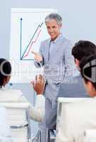 Charming businessman doing a presentation