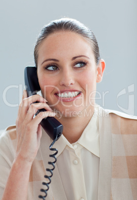 Attractive businesswoman talking on phone