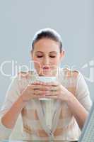 Beautiful businesswoman drinking a coffee