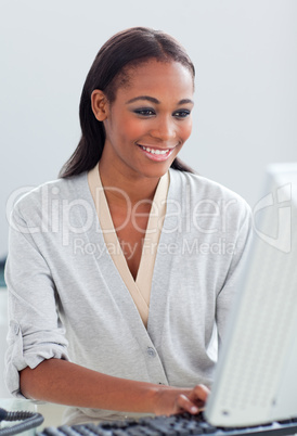 Charismatic businesswoman working at a computer