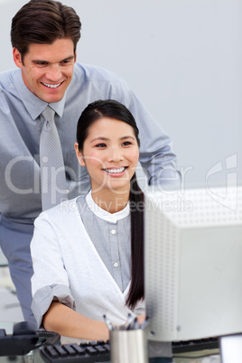 Cheerful businesswoman helping by her manager