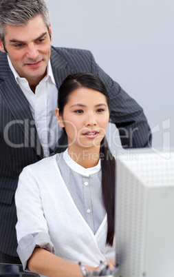 Asian businesswoman helping by her manager