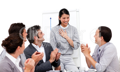 Victorious businesswoman applauded for her presentation