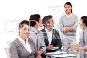Portrait of smiling business team during a presentation