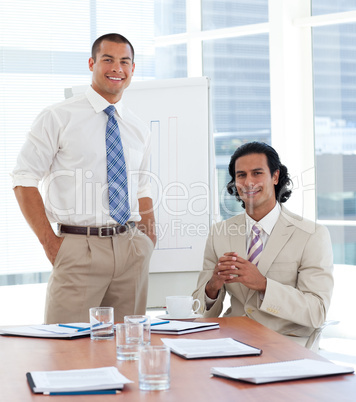 Smiling businessman giving a presentation