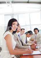 Portrait of a businesswoman and her team during a presentation