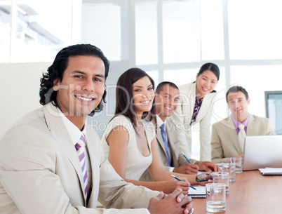 Portrait of a smiling business team in a meeting