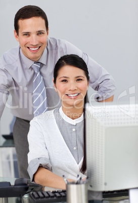 Attractive businesswoman helping by her manager