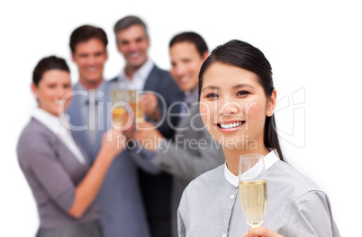 Asian businesswoman and her team celebrating a success