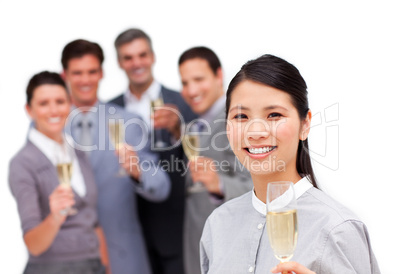 Brunette manager and her team celebrating a success