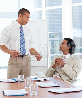 Serious businessman giving a presentation