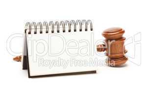 Blank Spiral Note Pad and Gavel on White
