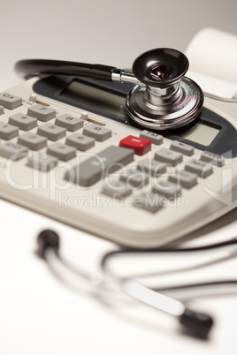 Black Stethoscope on Calculator