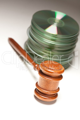 Stack of CD Rom or DVD Discs and Gavel