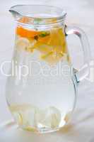 Pitcher with water and fruits