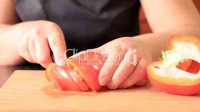 Cutting of pepper for salad.