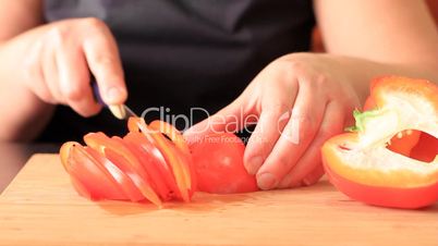 Cutting of pepper for salad.