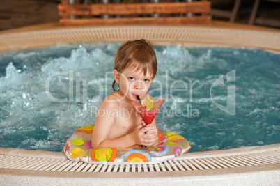 Boy with glass of coctail