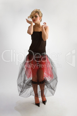 Beautiful girl in diaphanous skirt