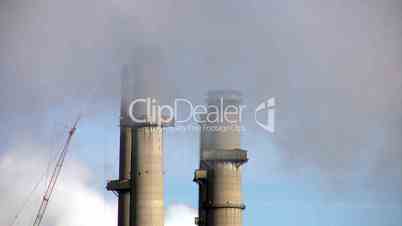 Power plant smokestacks close