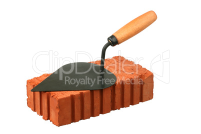 Building trowel and red brick