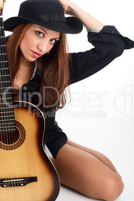 Woman with guitar.