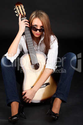 Woman with guitar.