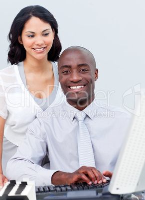 colleague working at a computer