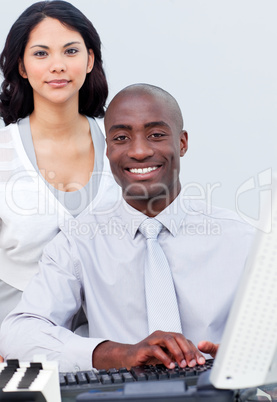 colleague working at a computer