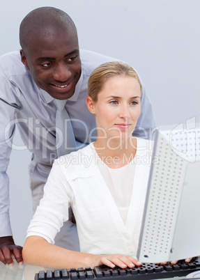 colleague working at a computer