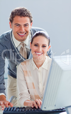 colleague work at a computer