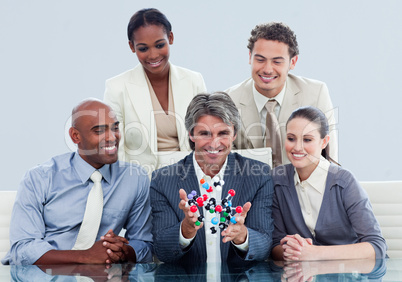 business team showing a molecule