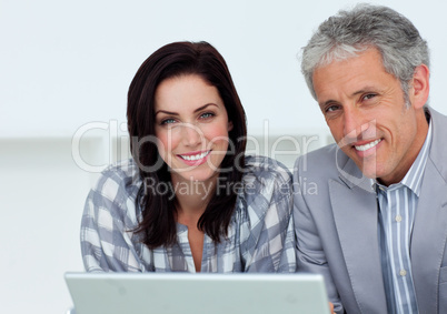 business people working at a computer