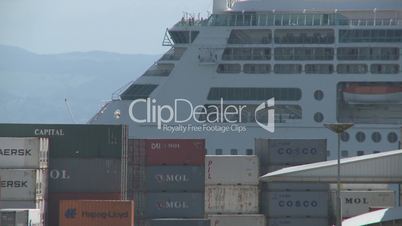 rear of cruise ship behind containers