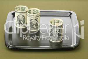 Money on a tray
