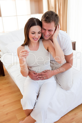 Blissful couple finding out results of a pregnancy test