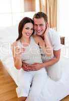 Enamoured couple finding out results of a pregnancy test