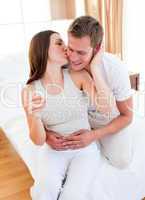 Affectionate couple finding out results of a pregnancy test