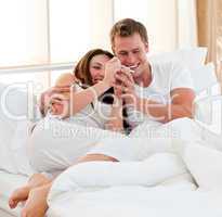 Lively couple finding out results of a pregnancy test