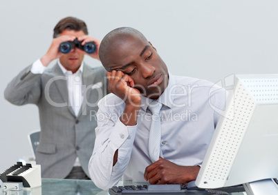 Unhappy businessman getting bored and his manager looking throug