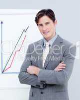 Confident businessman reporting sales figures