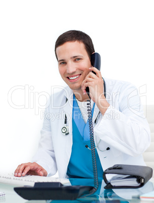 Young doctor talking on phone