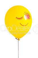 Yellow balloon with smile on white background