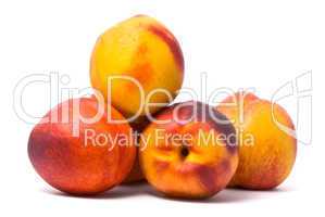 Juicy nectarines on a white background