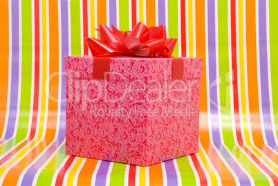 Gift box on a stripe background