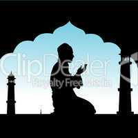 silhouette of human offering prayers at mosque