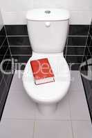 Book in the toilet