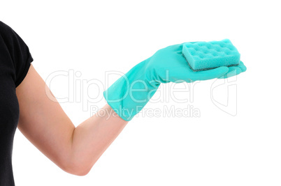 green sponge in hand